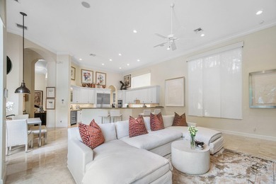 This stunning and meticulously maintained two-story courtyard on Country Club At Mirasol in Florida - for sale on GolfHomes.com, golf home, golf lot