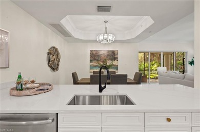 Come experience ultimate privacy in this stunning 1st floor on Tiburon Golf Club in Florida - for sale on GolfHomes.com, golf home, golf lot