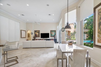 This stunning and meticulously maintained two-story courtyard on Country Club At Mirasol in Florida - for sale on GolfHomes.com, golf home, golf lot