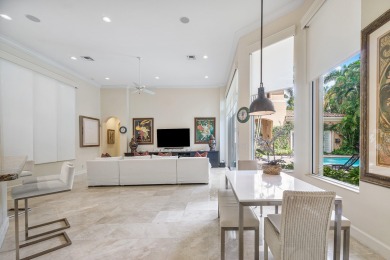 This stunning and meticulously maintained two-story courtyard on Country Club At Mirasol in Florida - for sale on GolfHomes.com, golf home, golf lot