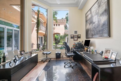 This stunning and meticulously maintained two-story courtyard on Country Club At Mirasol in Florida - for sale on GolfHomes.com, golf home, golf lot