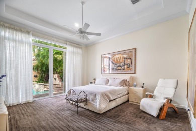 This stunning and meticulously maintained two-story courtyard on Country Club At Mirasol in Florida - for sale on GolfHomes.com, golf home, golf lot