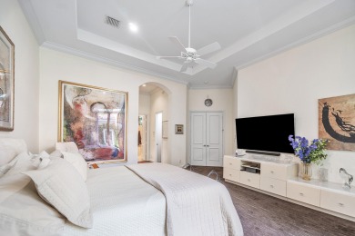 This stunning and meticulously maintained two-story courtyard on Country Club At Mirasol in Florida - for sale on GolfHomes.com, golf home, golf lot