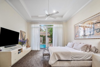 This stunning and meticulously maintained two-story courtyard on Country Club At Mirasol in Florida - for sale on GolfHomes.com, golf home, golf lot