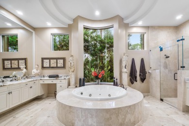 This stunning and meticulously maintained two-story courtyard on Country Club At Mirasol in Florida - for sale on GolfHomes.com, golf home, golf lot