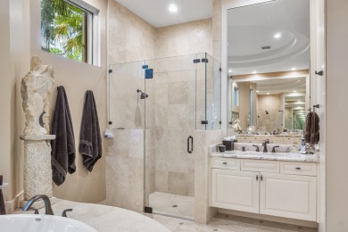 This stunning and meticulously maintained two-story courtyard on Country Club At Mirasol in Florida - for sale on GolfHomes.com, golf home, golf lot