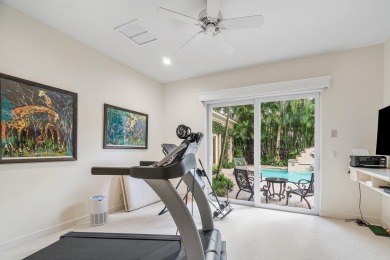 This stunning and meticulously maintained two-story courtyard on Country Club At Mirasol in Florida - for sale on GolfHomes.com, golf home, golf lot