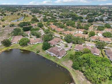Welcome to this charming 2-bedroom, 2-bath waterfront condo in on Falcon Watch Golf Club in Florida - for sale on GolfHomes.com, golf home, golf lot