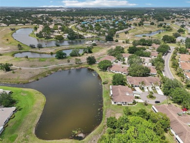 Welcome to this charming 2-bedroom, 2-bath waterfront condo in on Falcon Watch Golf Club in Florida - for sale on GolfHomes.com, golf home, golf lot