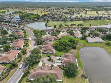 Welcome to this charming 2-bedroom, 2-bath waterfront condo in on Falcon Watch Golf Club in Florida - for sale on GolfHomes.com, golf home, golf lot