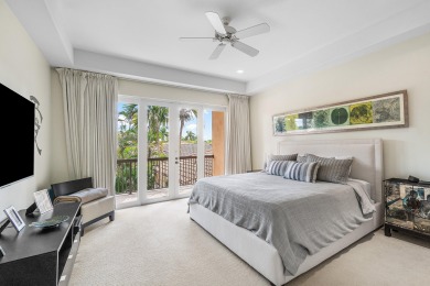 This stunning and meticulously maintained two-story courtyard on Country Club At Mirasol in Florida - for sale on GolfHomes.com, golf home, golf lot