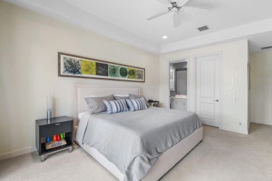 This stunning and meticulously maintained two-story courtyard on Country Club At Mirasol in Florida - for sale on GolfHomes.com, golf home, golf lot