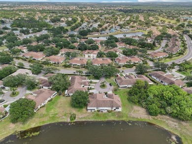 Welcome to this charming 2-bedroom, 2-bath waterfront condo in on Falcon Watch Golf Club in Florida - for sale on GolfHomes.com, golf home, golf lot