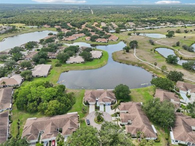 Welcome to this charming 2-bedroom, 2-bath waterfront condo in on Falcon Watch Golf Club in Florida - for sale on GolfHomes.com, golf home, golf lot