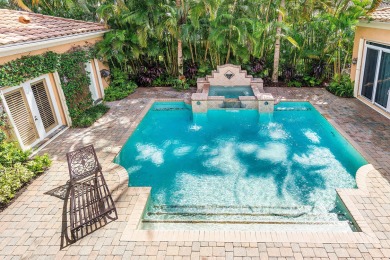 This stunning and meticulously maintained two-story courtyard on Country Club At Mirasol in Florida - for sale on GolfHomes.com, golf home, golf lot