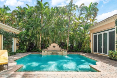 This stunning and meticulously maintained two-story courtyard on Country Club At Mirasol in Florida - for sale on GolfHomes.com, golf home, golf lot