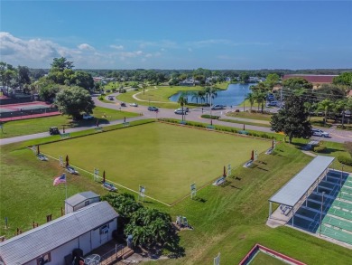 Welcome to this charming 2-bedroom, 2-bath waterfront condo in on Falcon Watch Golf Club in Florida - for sale on GolfHomes.com, golf home, golf lot