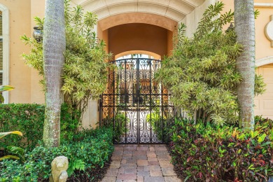 This stunning and meticulously maintained two-story courtyard on Country Club At Mirasol in Florida - for sale on GolfHomes.com, golf home, golf lot