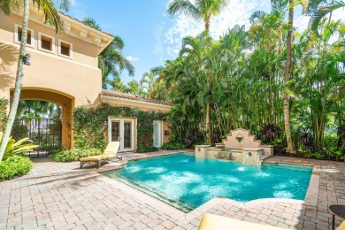 This stunning and meticulously maintained two-story courtyard on Country Club At Mirasol in Florida - for sale on GolfHomes.com, golf home, golf lot