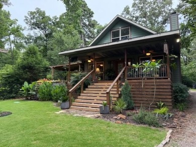 This private and peaceful lakefront home is located in the piney on Pine Dunes Golf Course in Texas - for sale on GolfHomes.com, golf home, golf lot