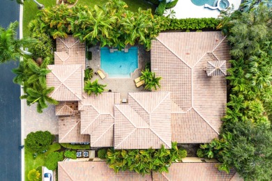 This stunning and meticulously maintained two-story courtyard on Country Club At Mirasol in Florida - for sale on GolfHomes.com, golf home, golf lot