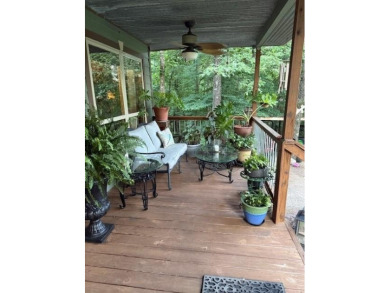 This private and peaceful lakefront home is located in the piney on Pine Dunes Golf Course in Texas - for sale on GolfHomes.com, golf home, golf lot
