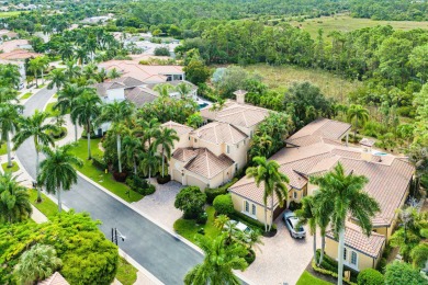 This stunning and meticulously maintained two-story courtyard on Country Club At Mirasol in Florida - for sale on GolfHomes.com, golf home, golf lot