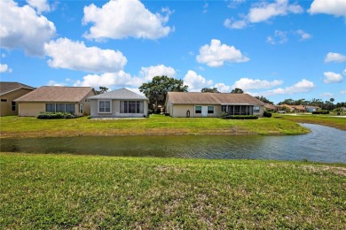 RECENT PRICE REDUCTION!! Looking for a place with tropical on Glen Lakes Country Club in Florida - for sale on GolfHomes.com, golf home, golf lot