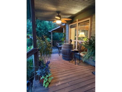 This private and peaceful lakefront home is located in the piney on Pine Dunes Golf Course in Texas - for sale on GolfHomes.com, golf home, golf lot