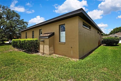 RECENT PRICE REDUCTION!! Looking for a place with tropical on Glen Lakes Country Club in Florida - for sale on GolfHomes.com, golf home, golf lot