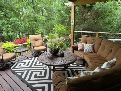 This private and peaceful lakefront home is located in the piney on Pine Dunes Golf Course in Texas - for sale on GolfHomes.com, golf home, golf lot