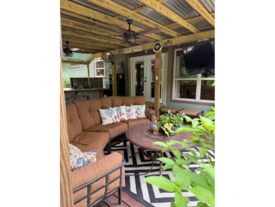 This private and peaceful lakefront home is located in the piney on Pine Dunes Golf Course in Texas - for sale on GolfHomes.com, golf home, golf lot