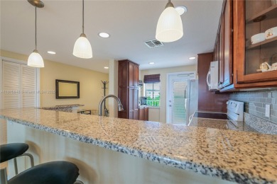 BEAUTIFUL CHARMING 2/2 CONDO WITH PEACEFUL VIEW OF THE LAKE on Palm-Aire Country Club and Resort - Palms in Florida - for sale on GolfHomes.com, golf home, golf lot