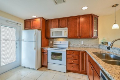 BEAUTIFUL CHARMING 2/2 CONDO WITH PEACEFUL VIEW OF THE LAKE on Palm-Aire Country Club and Resort - Palms in Florida - for sale on GolfHomes.com, golf home, golf lot