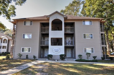 Welcome to this delightful furnished  first-floor 2-bedroom on Oyster Bay Golf Links in North Carolina - for sale on GolfHomes.com, golf home, golf lot