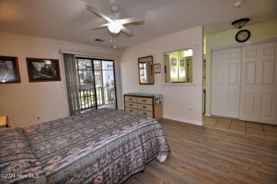 Welcome to this delightful furnished  first-floor 2-bedroom on Oyster Bay Golf Links in North Carolina - for sale on GolfHomes.com, golf home, golf lot