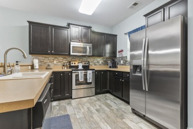 Welcome to this FIRST FLOOR 2-bedroom, 2-bath condo located in on Barefoot Resort and Golf Club  in South Carolina - for sale on GolfHomes.com, golf home, golf lot