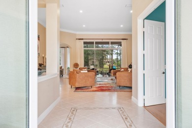 Discover luxury living in this beautifully updated pool home in on PGA Golf Club in PGA Village in Florida - for sale on GolfHomes.com, golf home, golf lot