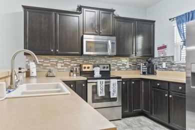 Welcome to this FIRST FLOOR 2-bedroom, 2-bath condo located in on Barefoot Resort and Golf Club  in South Carolina - for sale on GolfHomes.com, golf home, golf lot