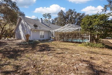 Welcome to this spacious and inviting 3/2.5 home offering almost on Chiefland Golf and Country Club in Florida - for sale on GolfHomes.com, golf home, golf lot
