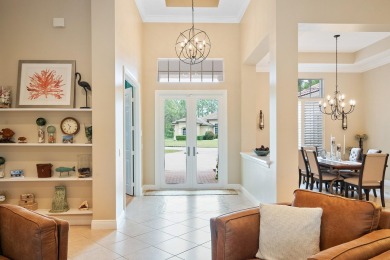 Discover luxury living in this beautifully updated pool home in on PGA Golf Club in PGA Village in Florida - for sale on GolfHomes.com, golf home, golf lot
