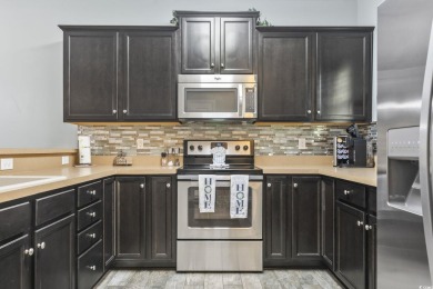 Welcome to this FIRST FLOOR 2-bedroom, 2-bath condo located in on Barefoot Resort and Golf Club  in South Carolina - for sale on GolfHomes.com, golf home, golf lot