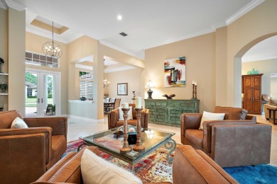 Discover luxury living in this beautifully updated pool home in on PGA Golf Club in PGA Village in Florida - for sale on GolfHomes.com, golf home, golf lot
