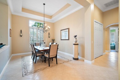 Discover luxury living in this beautifully updated pool home in on PGA Golf Club in PGA Village in Florida - for sale on GolfHomes.com, golf home, golf lot