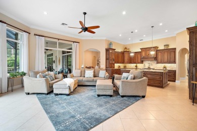 Discover luxury living in this beautifully updated pool home in on PGA Golf Club in PGA Village in Florida - for sale on GolfHomes.com, golf home, golf lot