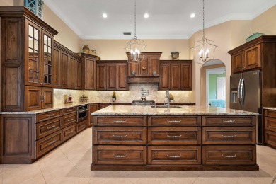 Discover luxury living in this beautifully updated pool home in on PGA Golf Club in PGA Village in Florida - for sale on GolfHomes.com, golf home, golf lot