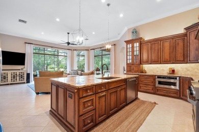 Discover luxury living in this beautifully updated pool home in on PGA Golf Club in PGA Village in Florida - for sale on GolfHomes.com, golf home, golf lot