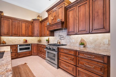 Discover luxury living in this beautifully updated pool home in on PGA Golf Club in PGA Village in Florida - for sale on GolfHomes.com, golf home, golf lot