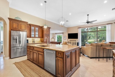 Discover luxury living in this beautifully updated pool home in on PGA Golf Club in PGA Village in Florida - for sale on GolfHomes.com, golf home, golf lot