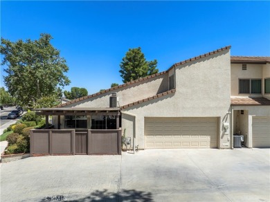 The immaculate end-unit is the largest model at the Valencia on Vista Valencia Golf Course in California - for sale on GolfHomes.com, golf home, golf lot